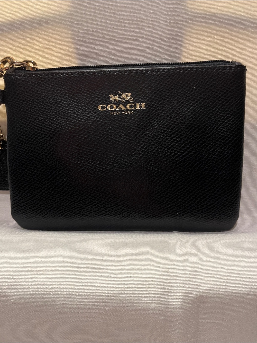 Coach Navy Blue Pebbled Leather Wristlet with Gold Logo and Hardware